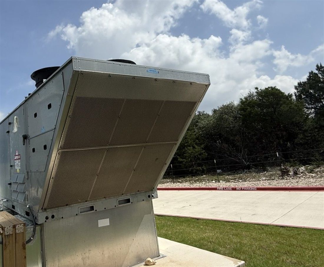 Air-cooled chiller installed by 512 Mechanical at a commercial building in Central Texas