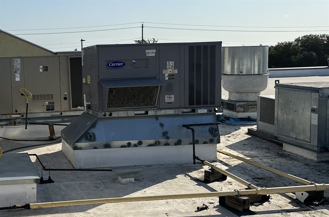 Rooftop make-up air unit, kitchen exhaust fan and condensing unit under a preventive maintenance program in Austin, Texas
